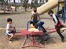 Kids on playground equipment 